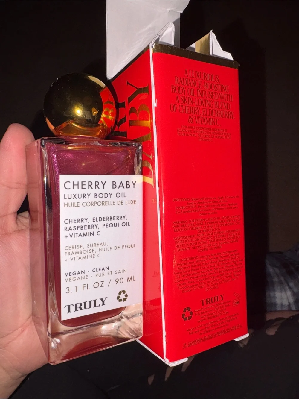 TRULY Cherry Baby Luxury Body Oil — Red Packaging with Gold Accent
